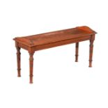 A WALNUT HALL BENCH IN THE MANNER OF JAMES SHOOLBRED