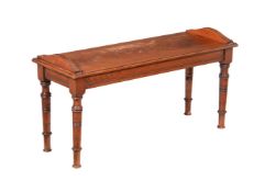 A WALNUT HALL BENCH IN THE MANNER OF JAMES SHOOLBRED