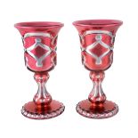 A PAIR OF VARNISH & CO. PALE-RUBY FLASHED, SILVERED AND CLEAR GLASS OVERLAY GOBLETS