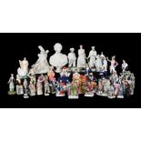 AN ASSORTMENT OF MOSTLY STAFFORDSHIRE POTTERY THEATRICAL GROUPS AND FIGURES