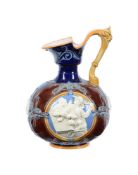 A MINTON MAJOLICA EWER IN MEDIEVALIST TASTE