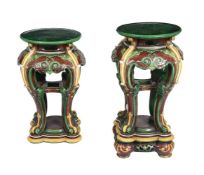 A PAIR OF MINTON MAJOLICA CHINOISERIE PEDESTALS ON STANDS