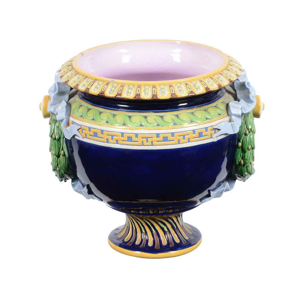 A MINTON MAJOLICA RIBBON AND WREATH JARDINIERE