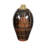 λ PHIL ROGERS (1951-2020), A BROWN AND GREEN (TENMOKU) GLAZED STONEWAR LARGE OVOID JAR