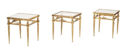 A SET OF THREE BRASS SIDE TABLES