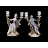 A PAIR OF MEISSEN PORCELAIN FIGURAL CANDELABRA