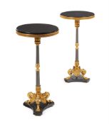 A PAIR OF GILT AND PATINATED METAL PEDESTAL OCCASIONAL TABLES IN EMPIRE STYLE