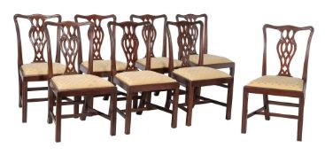 A SET OF EIGHT DINING CHAIRS IN GEORGE III STYLE