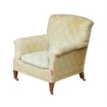 A WALNUT AND UPHOLSTERED ARMCHAIR IN VICTORIAN STYLE