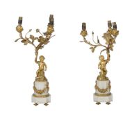 A PAIR OF FRENCH ORMOLU AND WHITE MARBLE THREE-LIGHT CANDELABRA