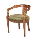 A MAHOGANY TUB ARMCHAIR IN EGYPTIAN REVIVAL TASTE