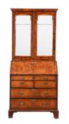 A GEORGE II WALNUT BUREAU BOOKCASE