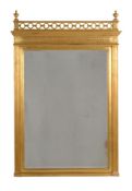 A GILTWOOD OVERMANTEL WALL MIRROR