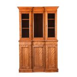 A VICTORIAN SATIN BIRCH BOOKCASE CABINET