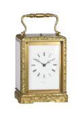 A FRENCH BRASS CARRIAGE CLOCK WITH PUSH-BUTTON REPEAT AND FOLIATE CAST ONE-PIECE CASE