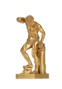 A GILT BRONZE FIGURE OF THE DANCING FAUN WITH CYMBALS