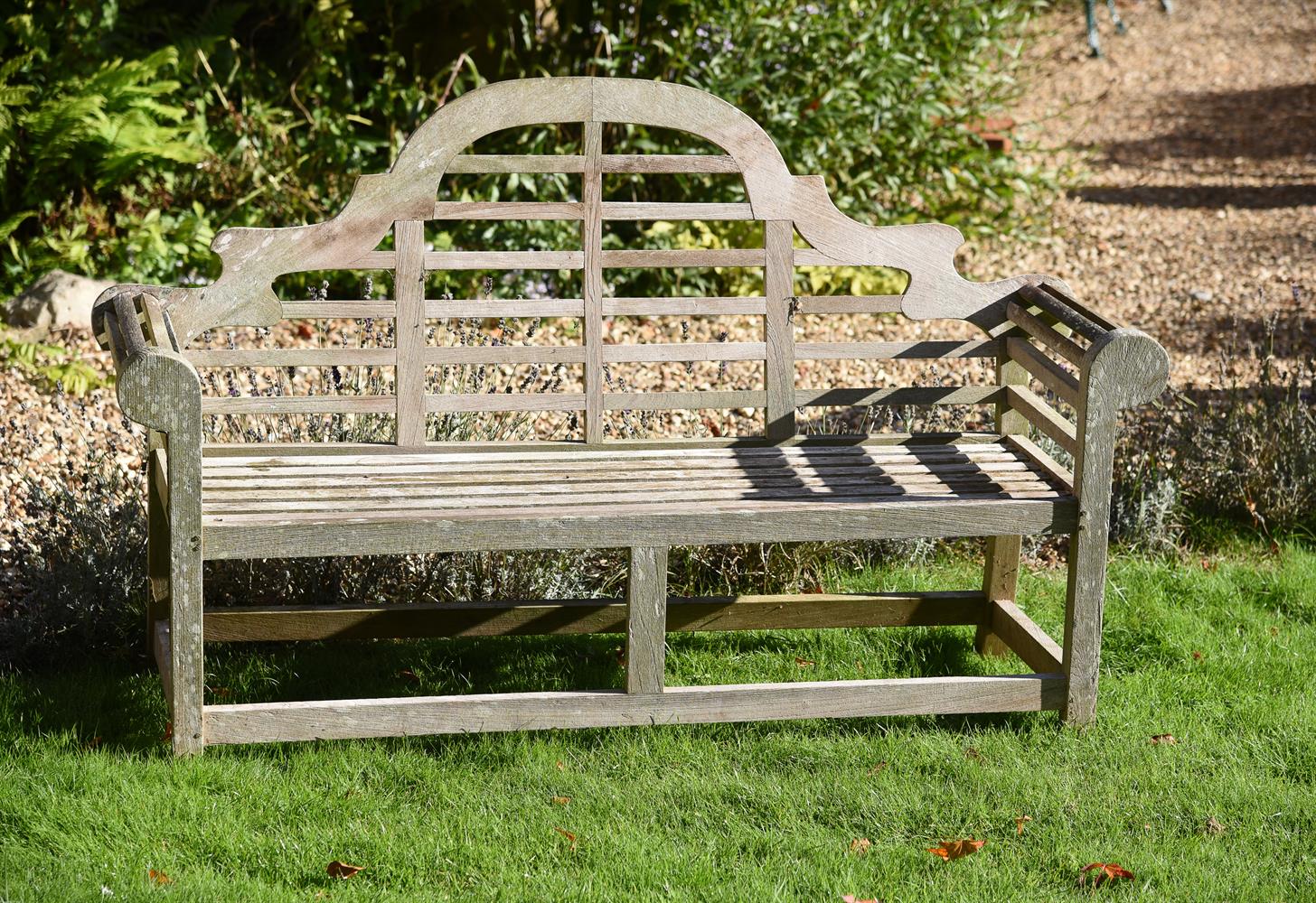 A MODERN HARDWOOD GARDEN BENCH