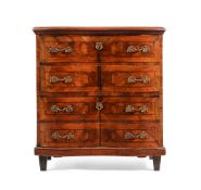 A CONTINENTAL FIGURED WALNUT AND INLAID CHEST OF DRAWERS, POSSIBLY ITALIAN OR SOUTH GERMAN