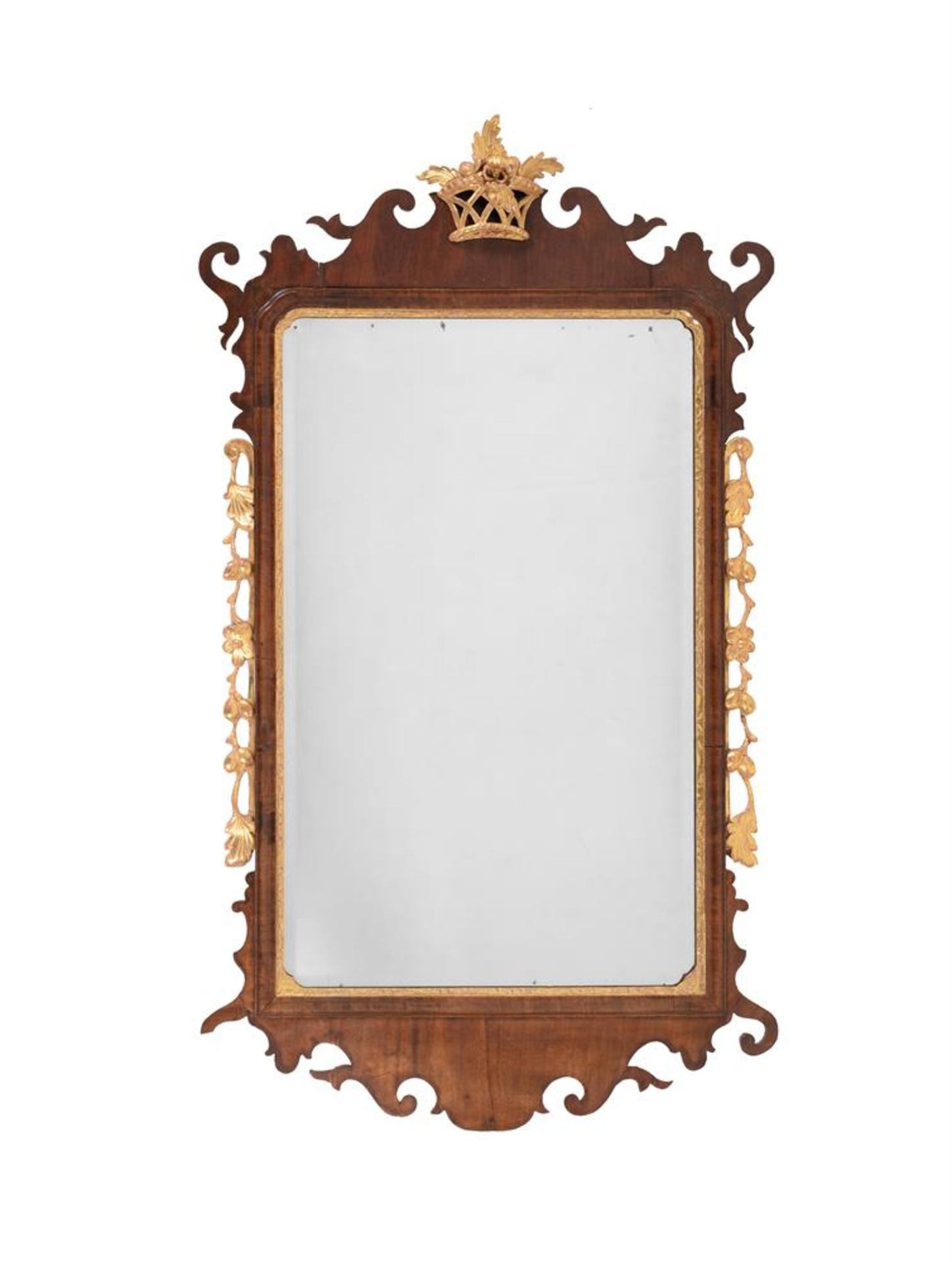 A GEORGE II MAHOGANY AND GILTWOOD WALL MIRROR