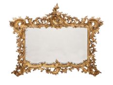 A GILTWOOD MIRROR IN MID 18TH CENTURY STYLE