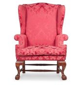 A MAHOGANY AND UPHOLSTERED ARMCHAIR IN GEORGE III STYLE