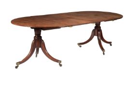 A MAHOGANY DINING TABLE