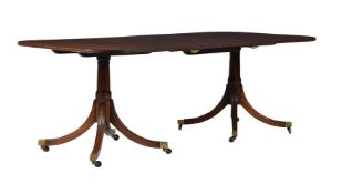 A MAHOGANY DINING TABLE IN GEORGE III STYLE