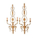 A PAIR OF GILT COMPOSITION WALL LIGHTS IN 18TH CENTURY TASTE