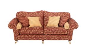 AN UPHOLSTERED SOFA