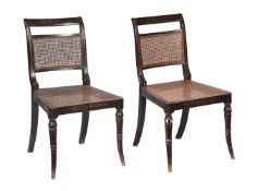 A PAIR OF REGENCY EBONISED AND DECORATED SIDE CHAIRS
