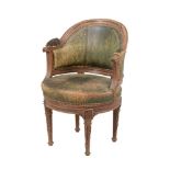 A BEECH AND GREEN LEATHER UPHOLSTERED ARMCHAIR IN FRENCH TASTE