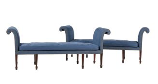 A PAIR OF MAHOGANY AND BLUE UPHOLSTERED WINDOW SEATS IN REGENCY STYLE