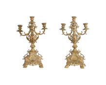 A PAIR OF FRENCH GILT METAL CANDELABRA