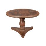 AN ANGLO-INDIAN HARDWOOD CIRCULAR CENTRE OR DINING TABLE