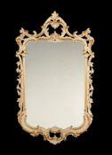 A CREAM PAINTED AND PARCEL GILT WALL MIRROR IN 18TH CENTURY STYLE