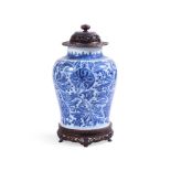 A CHINESE TRANSITIONAL BLUE AND WHITE BALUSTER VASE, CIRCA 1700