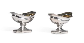 A PAIR OF GEORGE III SILVER SHAPED OVAL PEDESTAL SALTS, ABSTINANDO KING, LONDON 1799 AND 1800