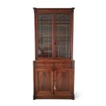 A GEORGE IV MAHOGANY BOOKCASE, IN THE MANNER OF GILLOWS, CIRCA 1825