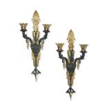 A PAIR OF FRENCH BRONZE AND GILT METAL TWIN-LIGHT WALL APPLIQUÉS, IN EMPIRE STYLE