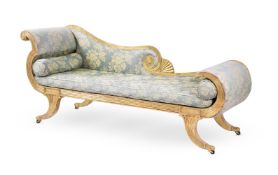 A REGENCY GILTWOOD AND UPHOLSTERED CHAISE LONGUE, IN THE MANNER OF GILLOWS