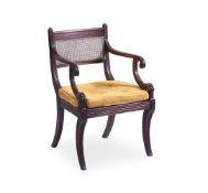 A REGENCY CARVED MAHOGANY OPEN ARMCHAIR, IN THE MANNER OF MARSH & TATHAM