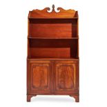 Y A REGENCY MAHOGANY WATERFALL OPEN BOOKCASE, CIRCA 1820