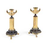 A PAIR OF EMPIRE BRONZE AND ORMOLU CANDLE HOLDERS, FRENCH, CIRCA 1820