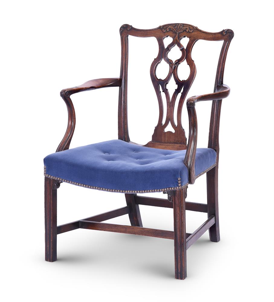 A GEORGE III MAHOGANY OPEN ARMCHAIR, IN THE MANNER OF THOMAS CHIPPENDALE