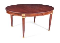 A FRENCH MAHOGANY AND GILT METAL MOUNTED EXTENDING DINING TABLE, CIRCA 1900