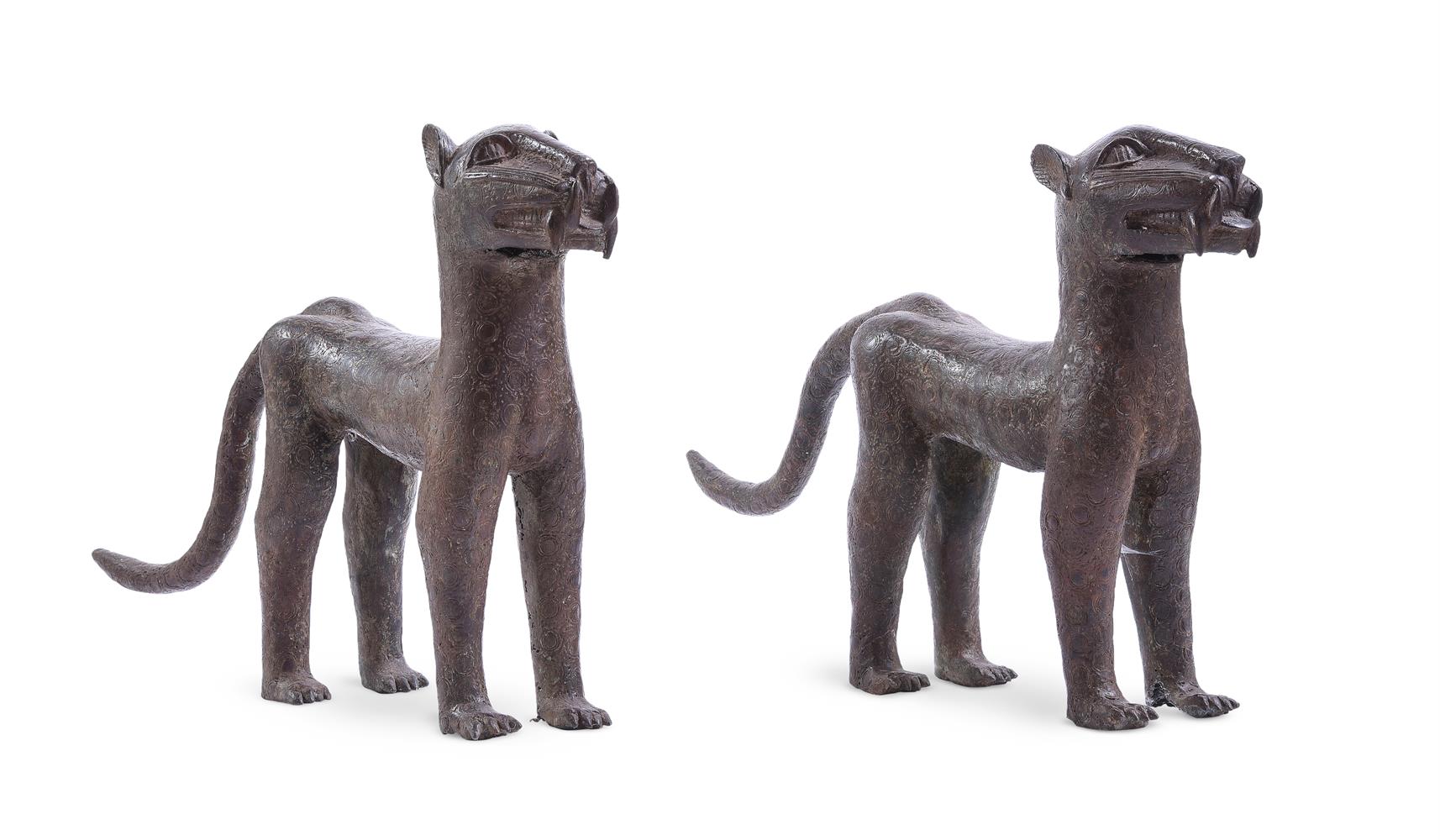 A PAIR OF BRONZE LEOPARDS, IN THE BENIN STYLE