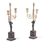 A PAIR OF EMPIRE BRONZE AND GILT METAL TWIN-LIGHT CANDELABRA, CIRCA 1805