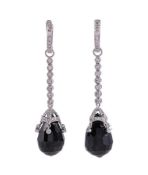 A PAIR OF ONYX AND DIAMOND DROP EARRINGS