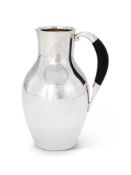 Y GEORG JENSEN, A DANISH SILVER COLOURED WATER JUG OR PITCHER