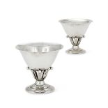 GEORG JENSEN, A PAIR OF DANISH SILVER COLOURED PEDESTAL BOWLS